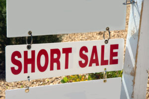 white sign that says short sale